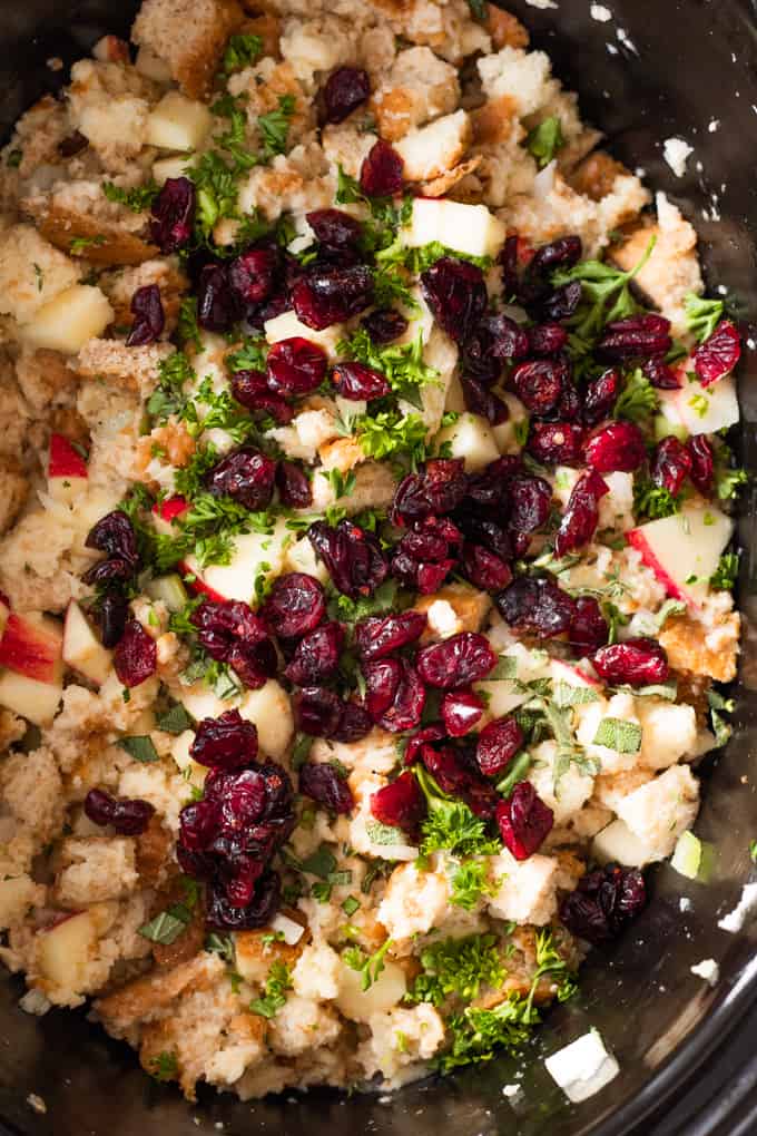 Ingredients in a slow cooker to make slow cooked stuffing.