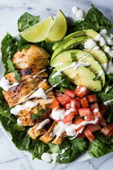 This tender, juicy, zesty chili lime chicken is perfect for topping your salad! This easy recipe takes just minutes to prepare! Perfect for a weeknight dinner!