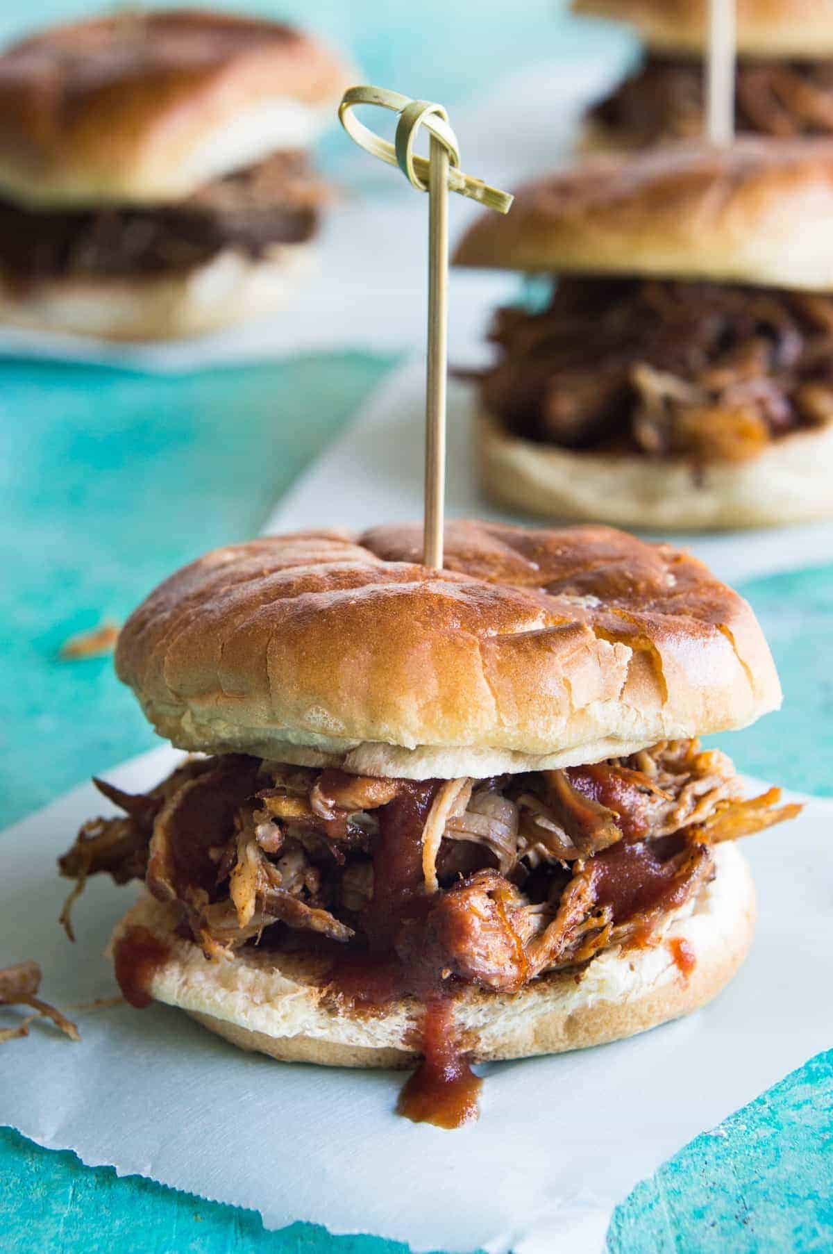 Perfect Slow Cooker Pulled Pork. This Texas style pulled pork is made easier in the slow cooker. Perfect for enjoying as a BBQ Pulled Pork Sandwich, or loaded up on nachos, or even as a pizza topping! The possibilities are endless!