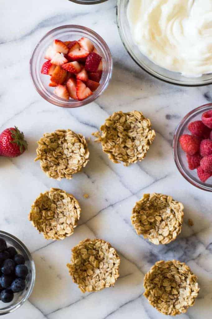 These Fruit and Yogurt Granola Cups are super easy to make for breakfast! Fill with your favorite yogurt and fresh fruits for a complete healthy meal! 