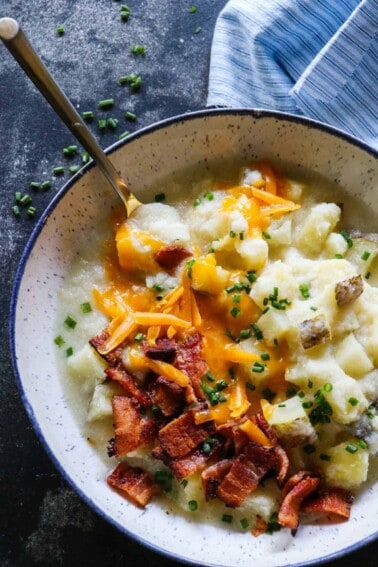 This Potato Soup is smooth and creamy. Loaded with chunks of potato. Plus it's secretly healthy, made with no milk or cream!