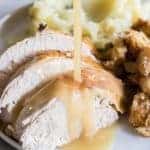 Tender and juicy turkey perfect for Thanksgiving day. Plus instructions on how to make turkey stock, gravy and stuffing too! 