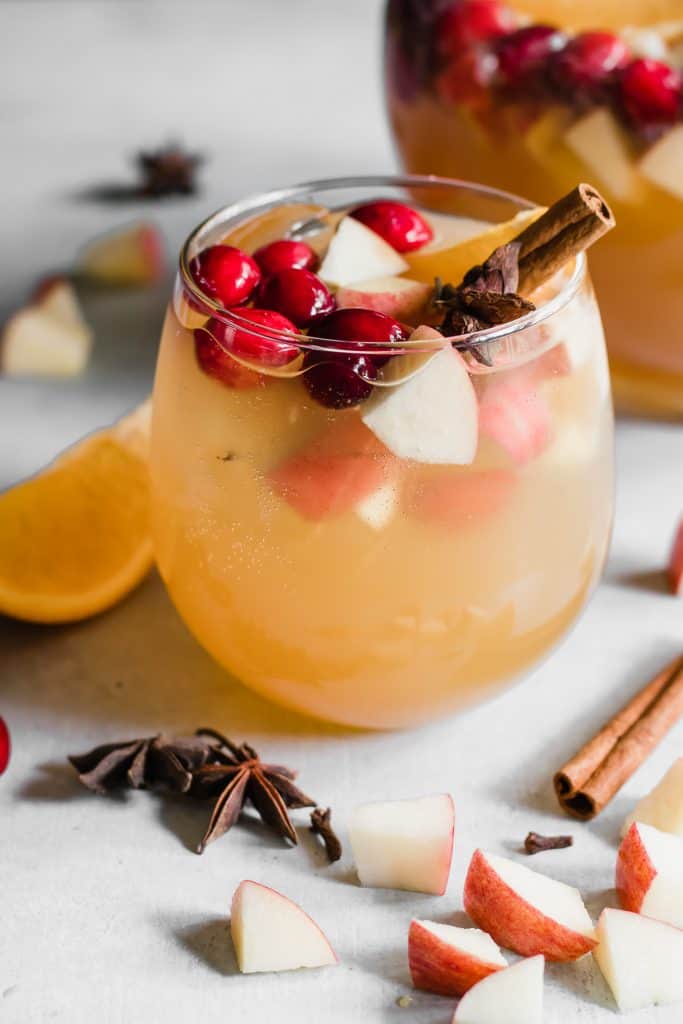 Sparkling Apple Cider Sangria. Sparkling Apple cider loaded up with chunks of apple, orange, cranberries, and all the best fall spices. No alcohol included makes this perfect for the entire family! 