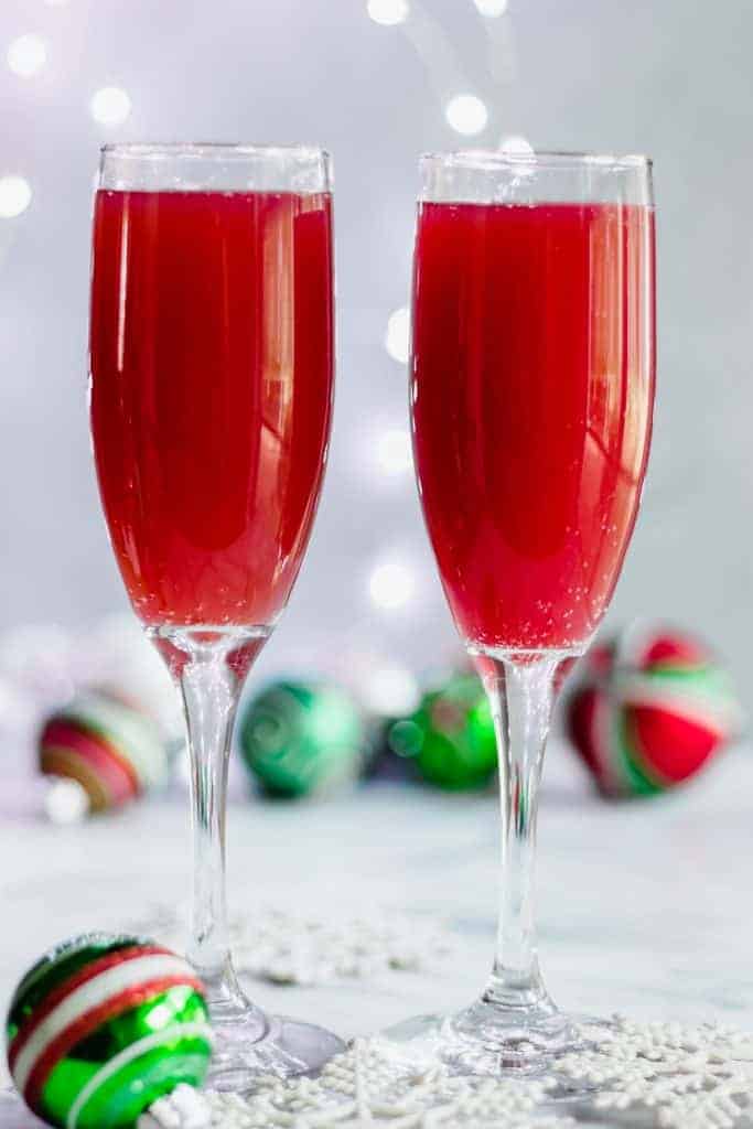 Christmas Mimosas! Celebrate Christmas in the morning with this mimosa that has a combination of orange juice and pomegranate juice! 