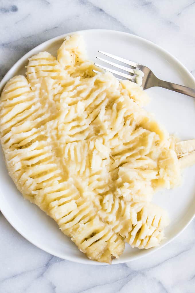 Mashed up bananas for banana bread crumb cake.
