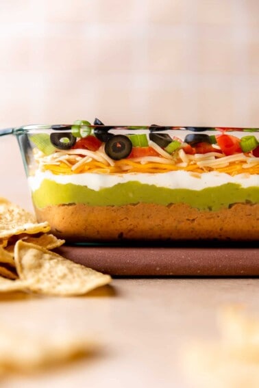 Glass dish showing layers in the seven layer dip.