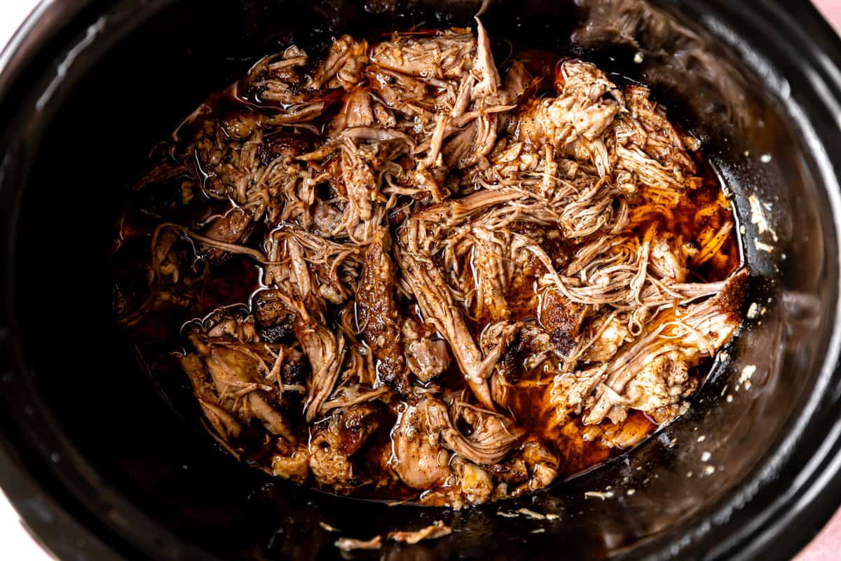 Pulled pork in a slow cooker.