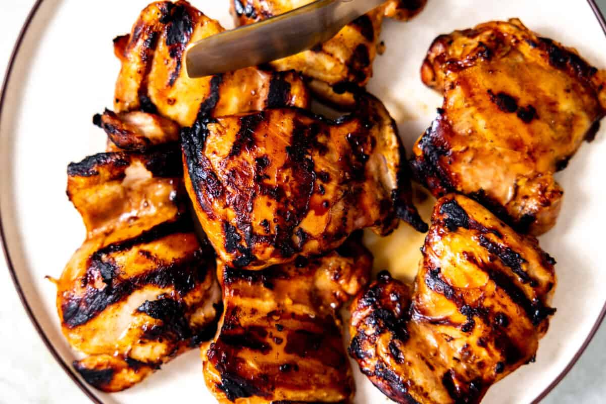 Grilled huli huli chicken on a plate. 