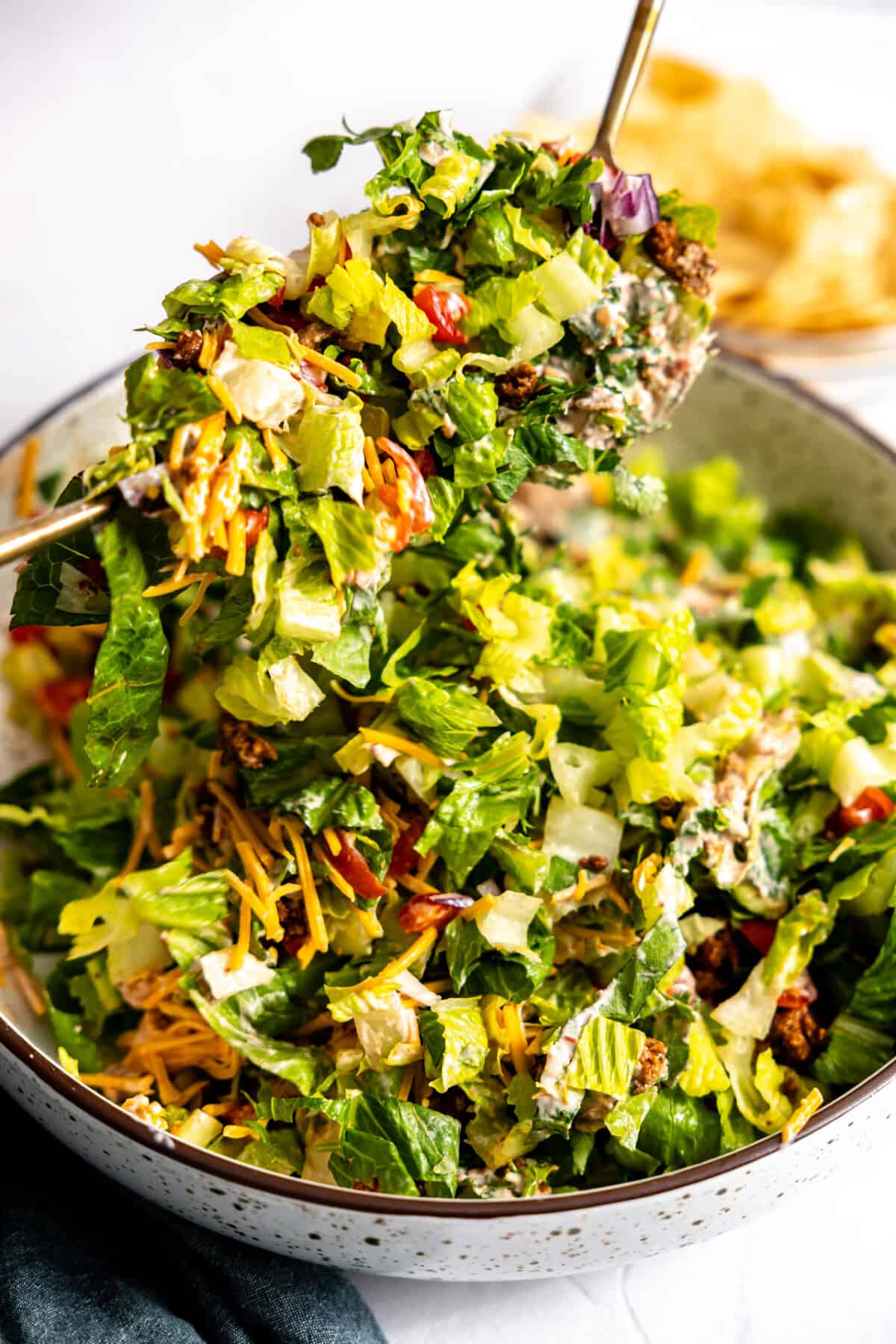 Serving taco salad.