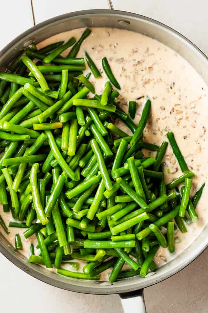 Green beans added on top of a creamy mushroom sauce.