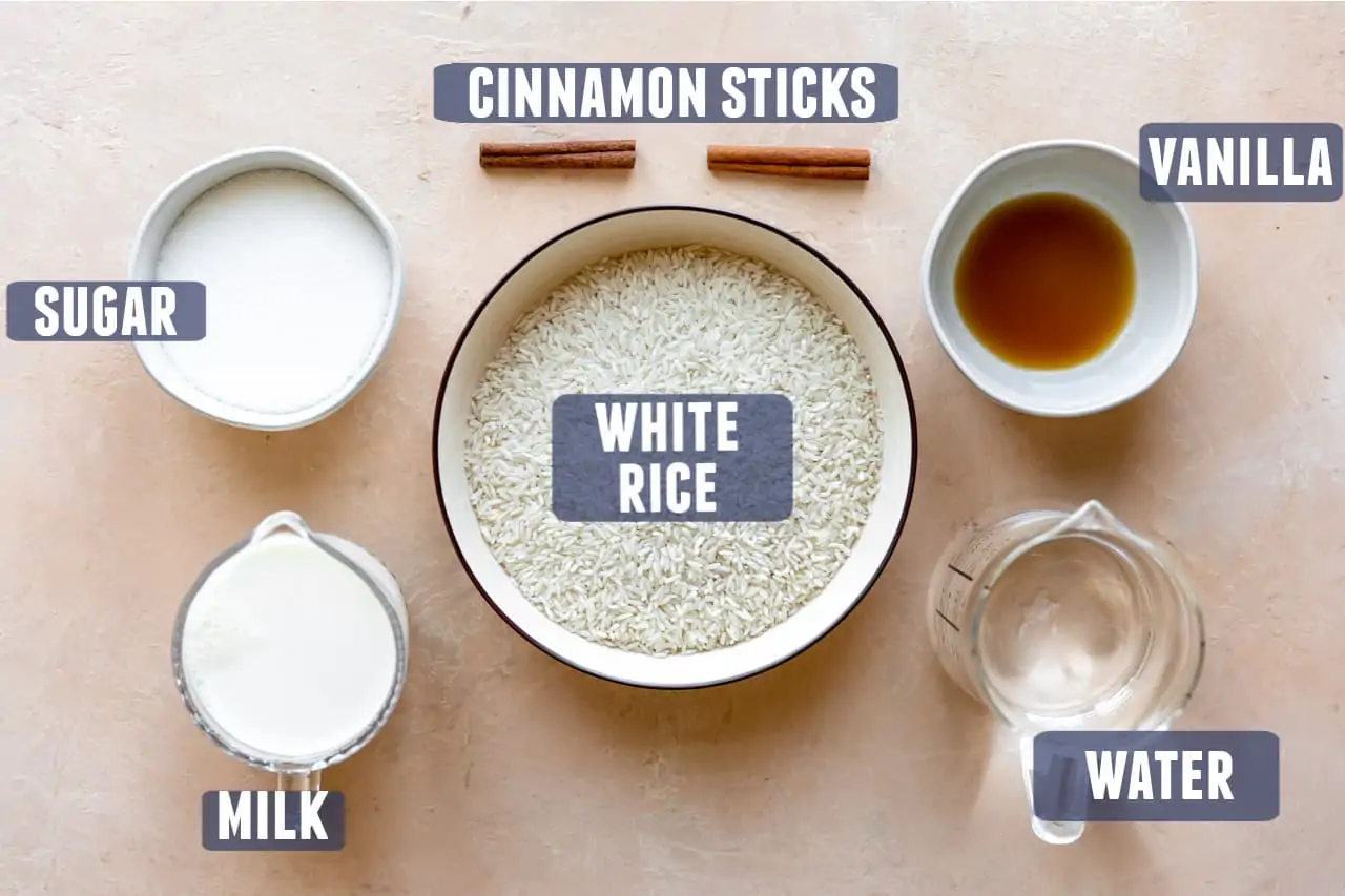 Ingredients needed to make homemade horchata laid out on the counter. 