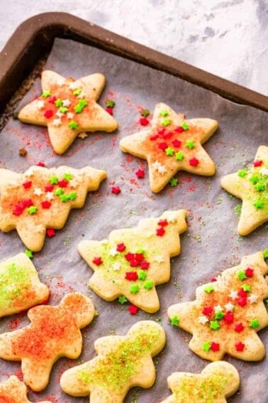 Sugar cookies on a baking sheet.
