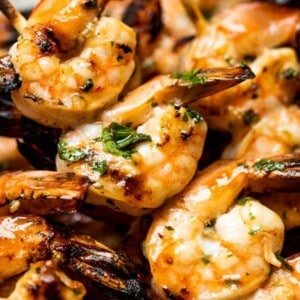 Up close view of shrimp on skewers after being grilled.