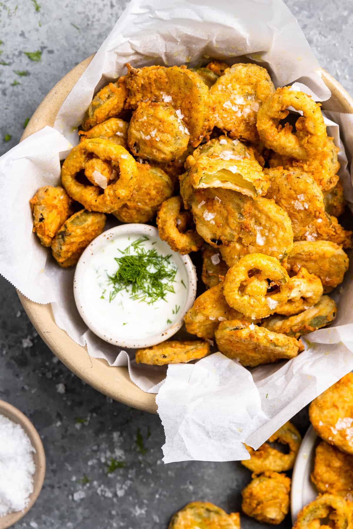 Basket of fried pickles and jalapeños served. with ranch.