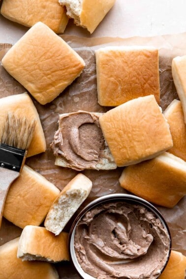Texas Roadhouse Rolls topped with a swirl of cinnamon Honey butter.