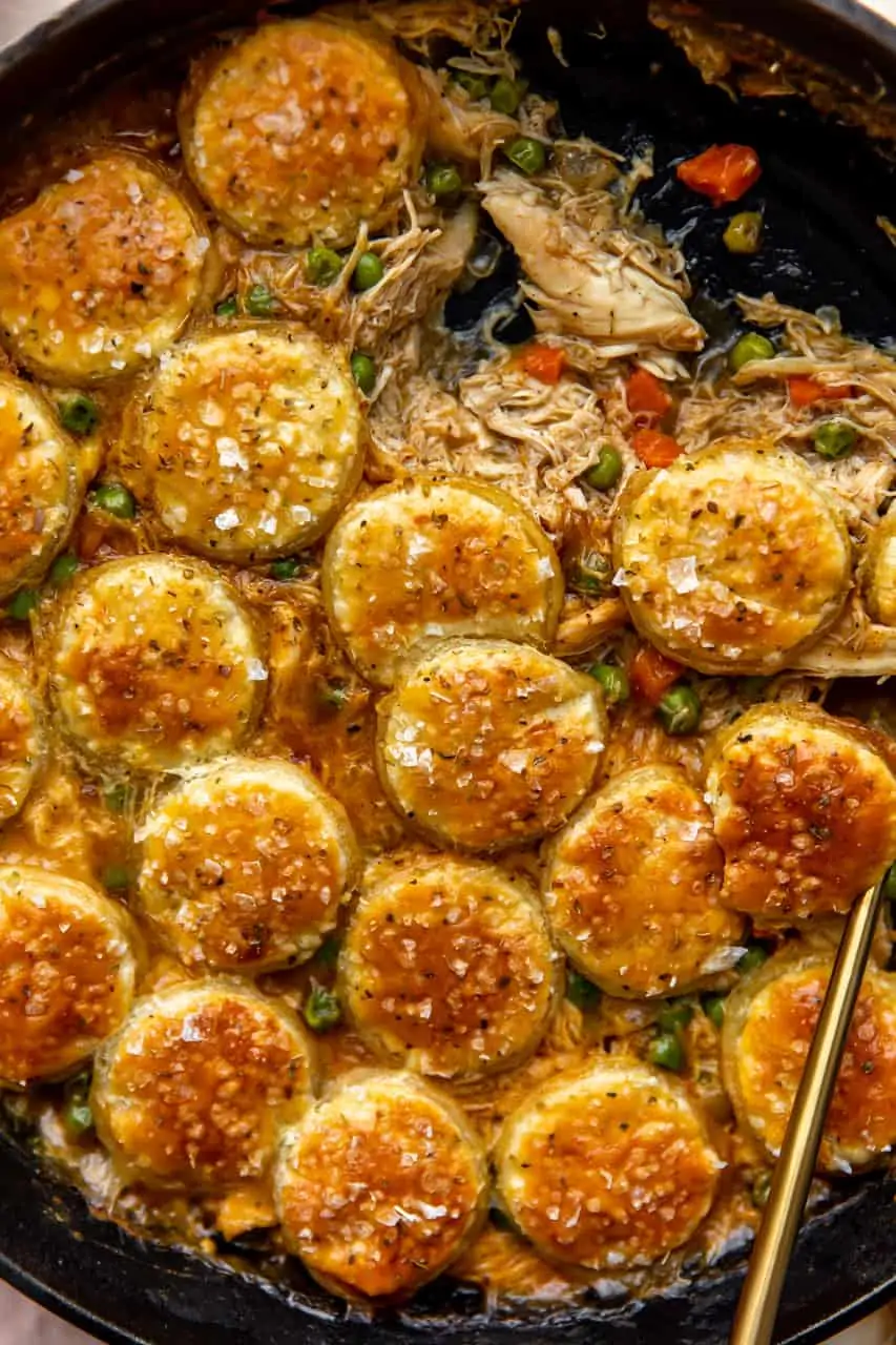 Up close baked pot pie in a cast iron skillet.