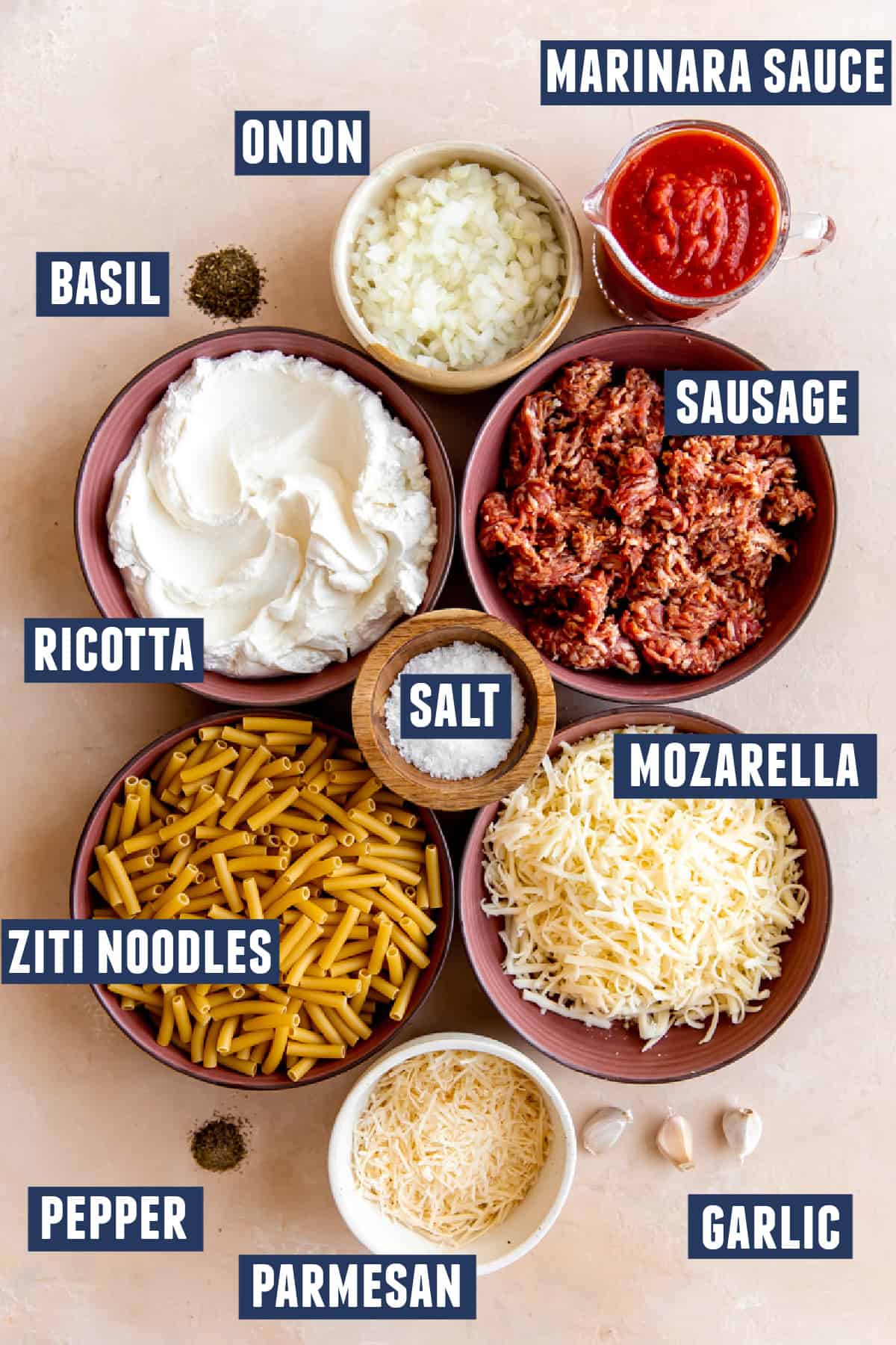 Ingredients needed to make baked ziti. 