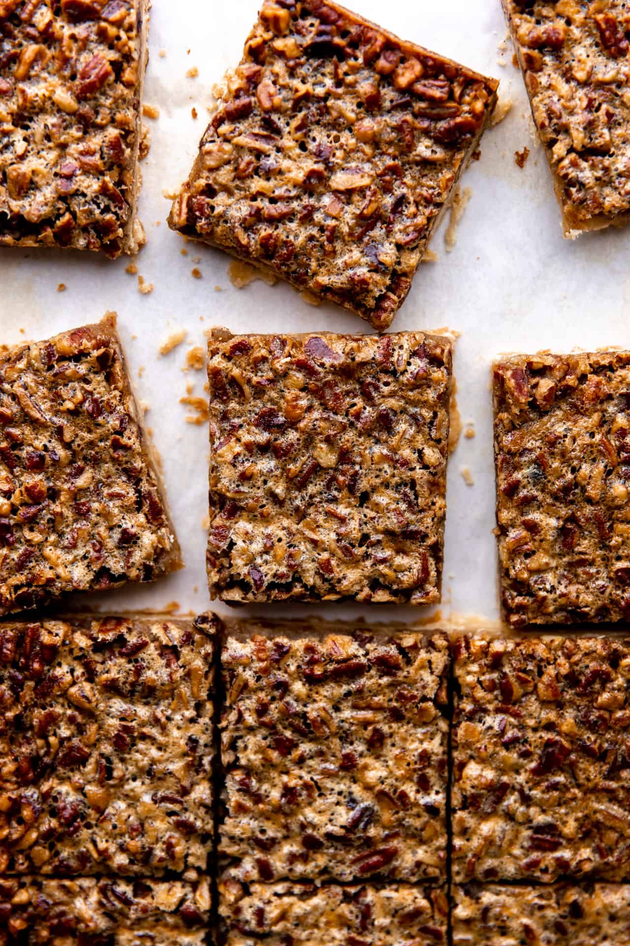 Pecan pie bars after baking cut into pieces.