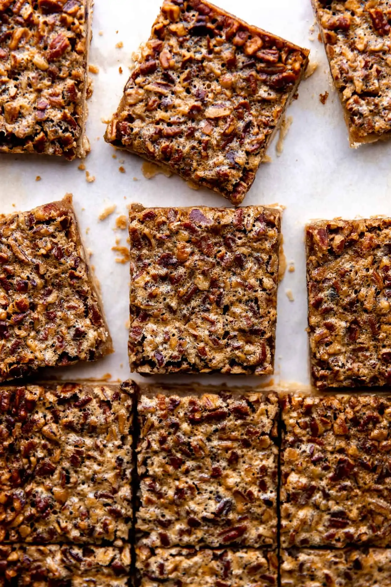 Pecan pie bars after baking cut into pieces.