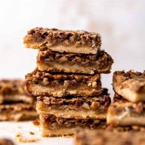 Stack of homemade pecan pie bars.