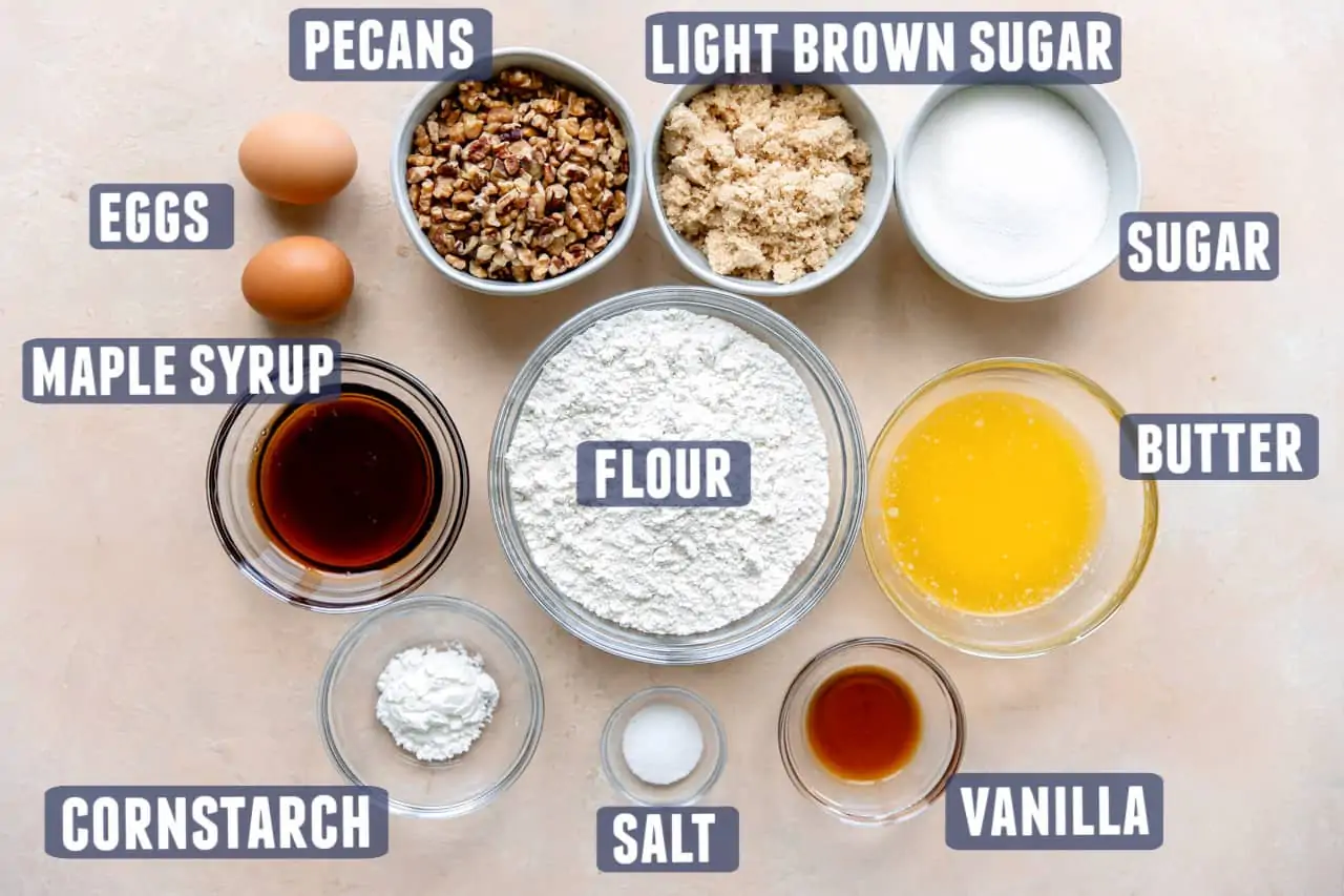 Ingredients needed for homemade pecan pie bars.