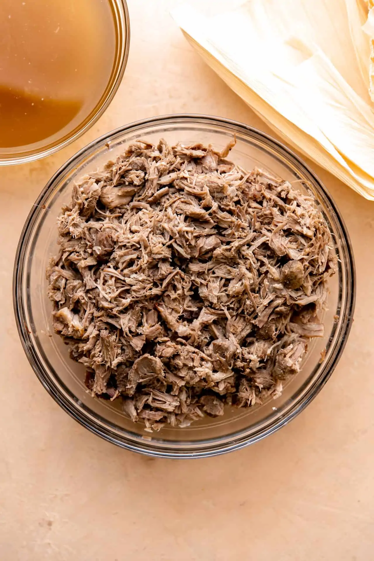Bowl of pork shredded for making tamales