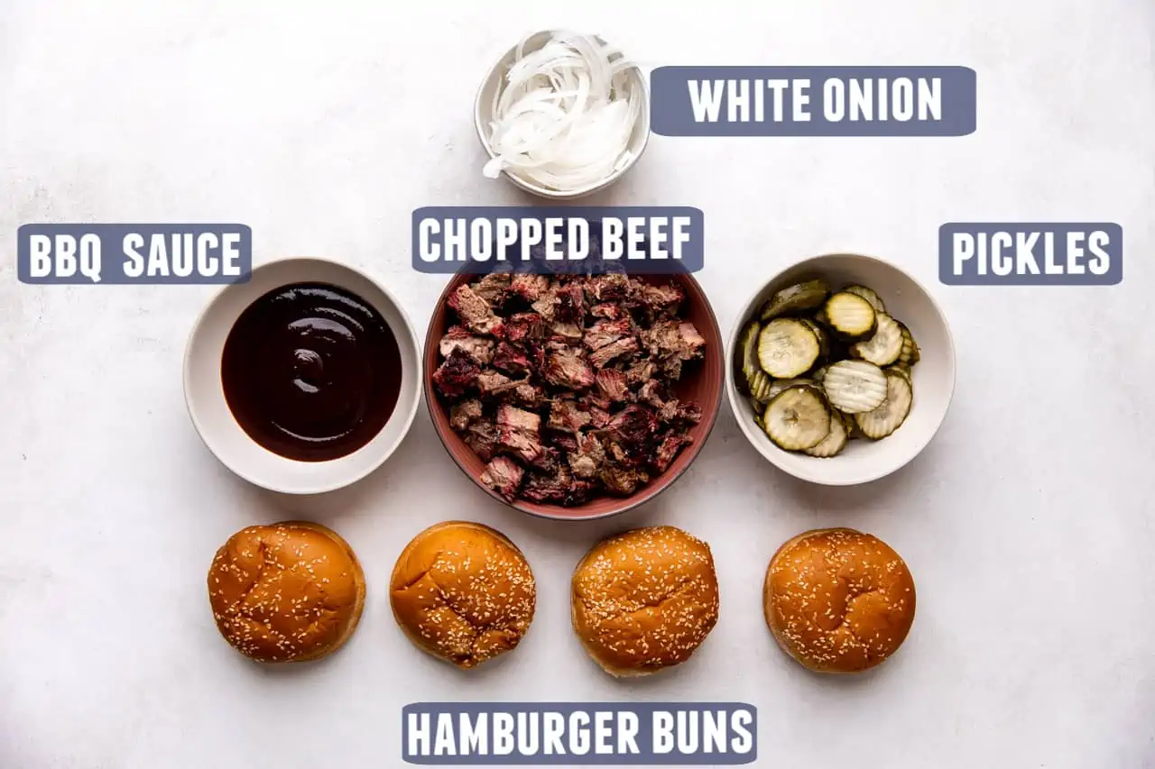 Ingredients needed to make a chopped beef sandwich laid out on the counter.