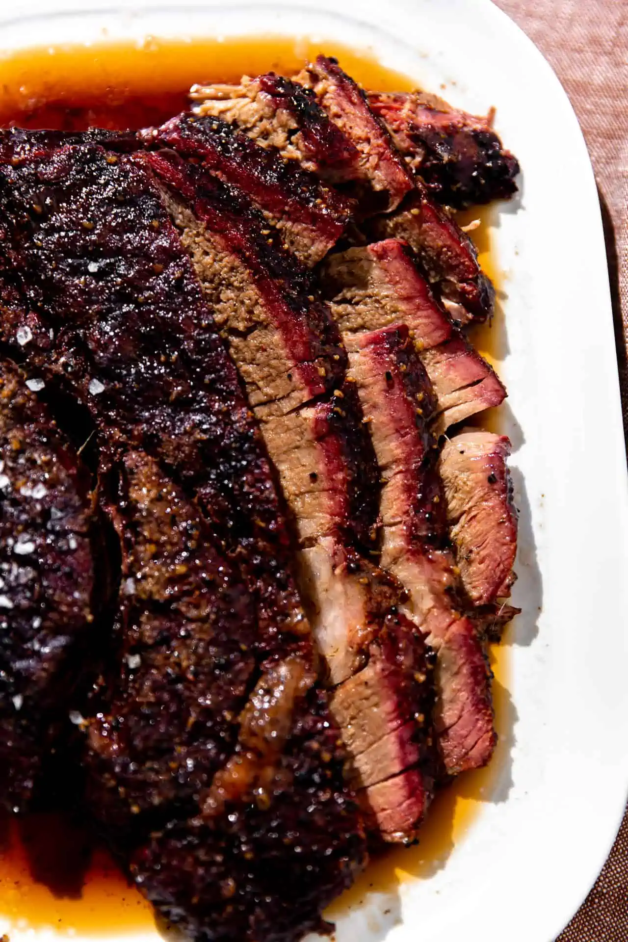 Sliced smoked chuck roast.