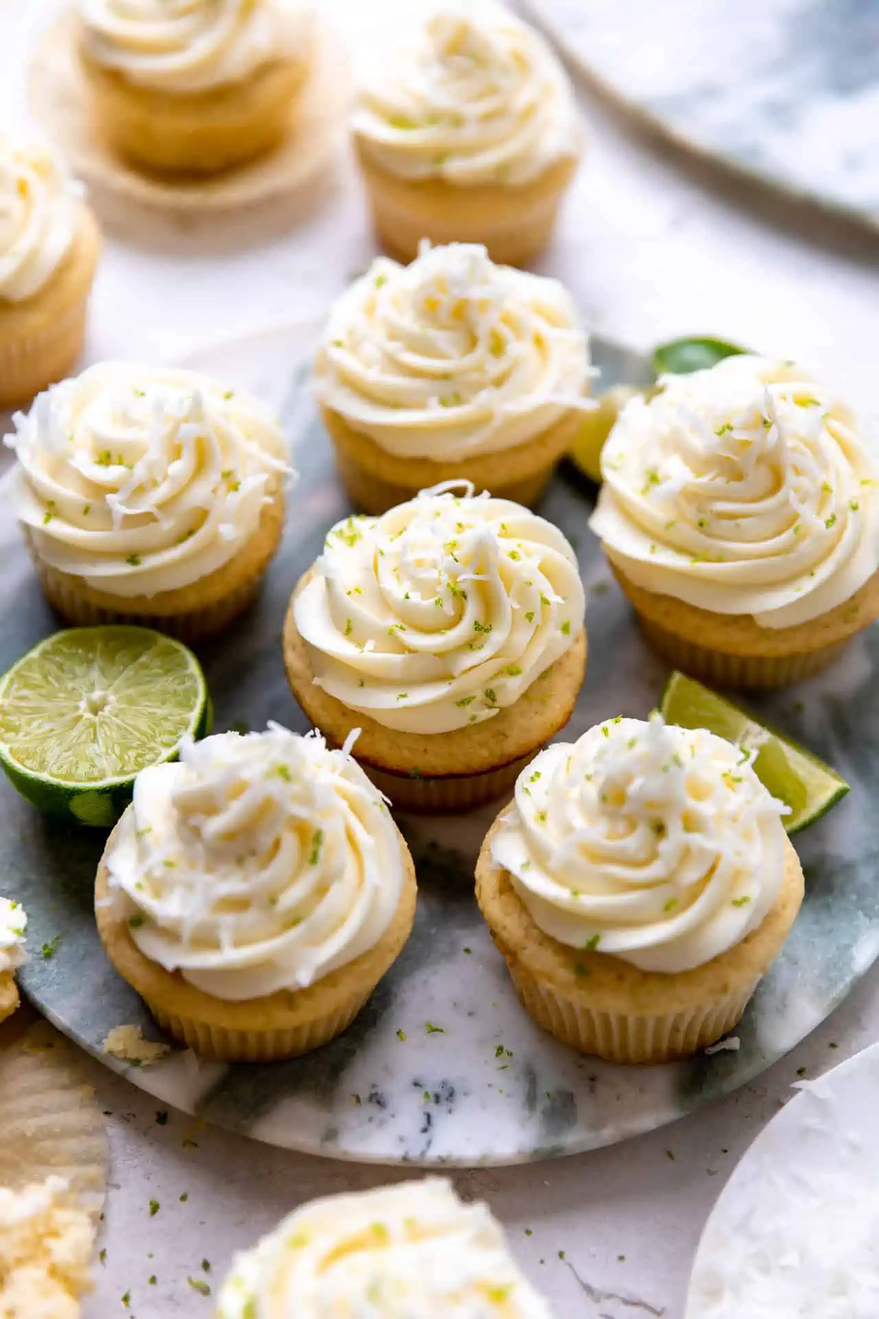 Tray filled with coconut lime cupcakes.