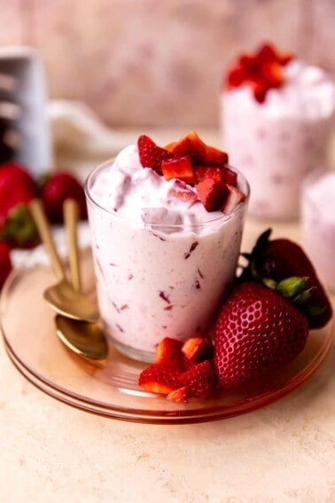 Fresas con Crema served with extra strawberries.