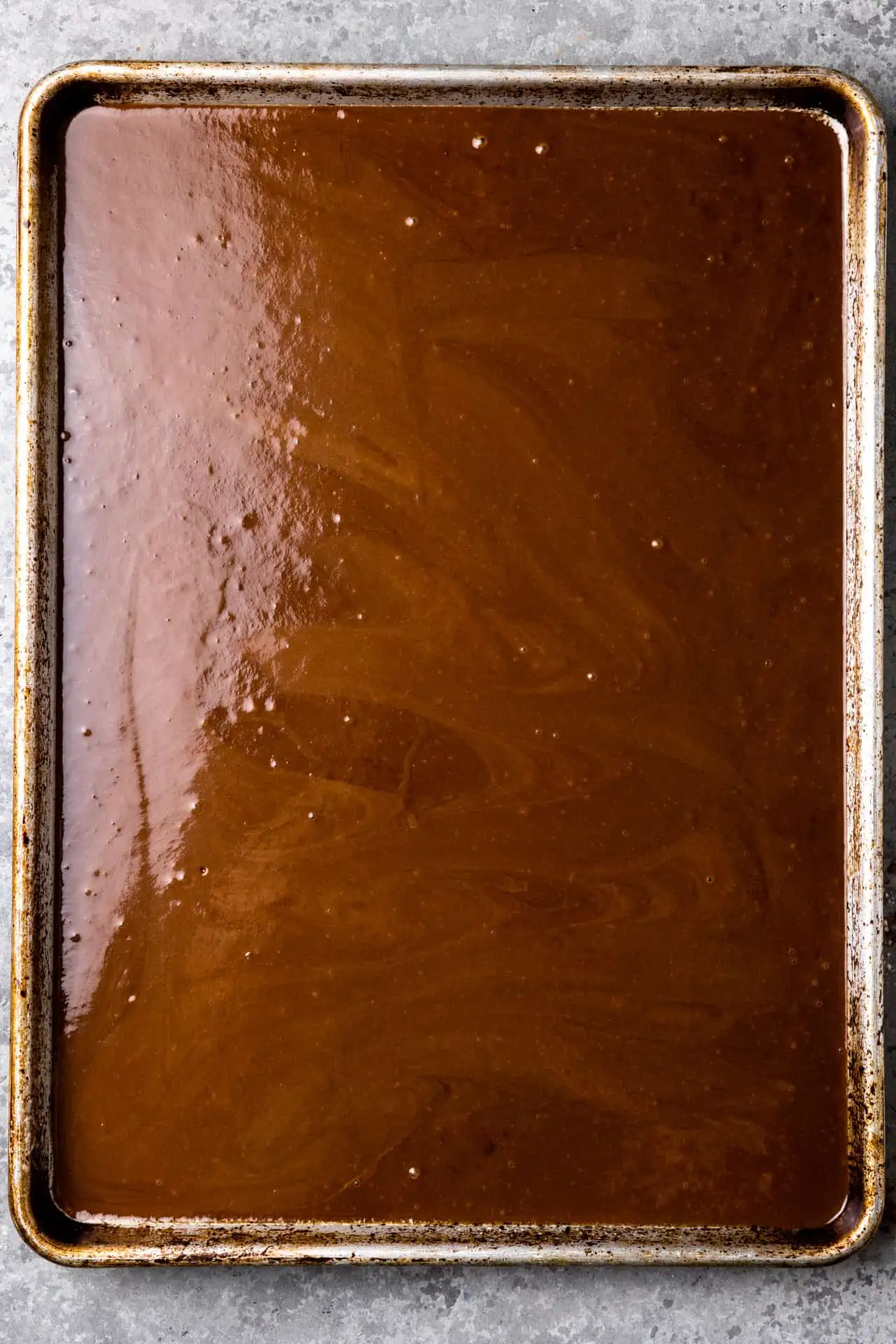 Overhead of Texas Sheet cake after icing has been poured on top. 