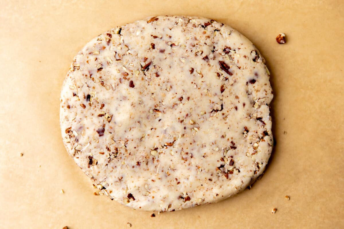 Snowball cookie dough pressed out and ready to chill.
