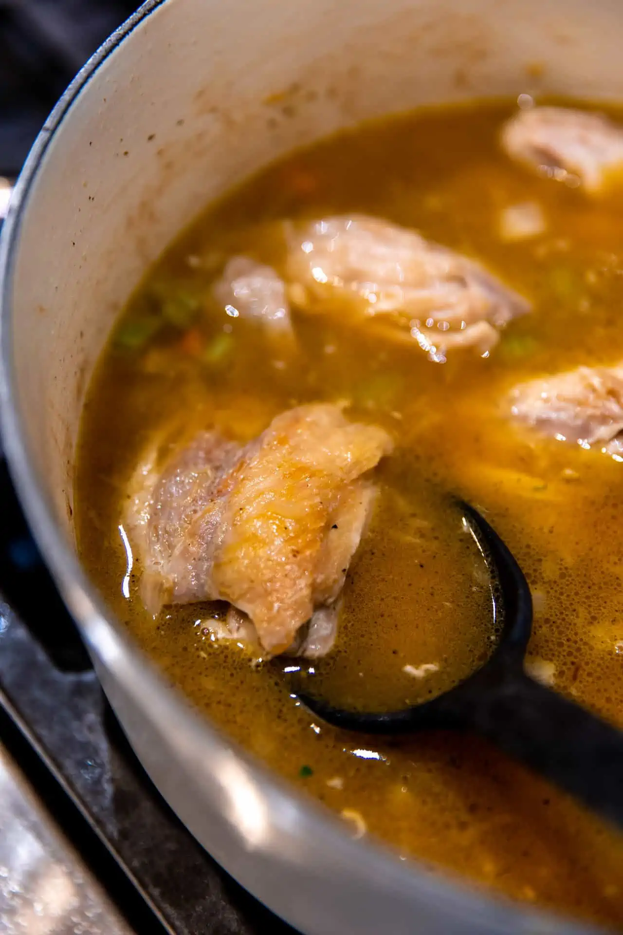 How to make chicken and dumplings, removing the chicken to shred.