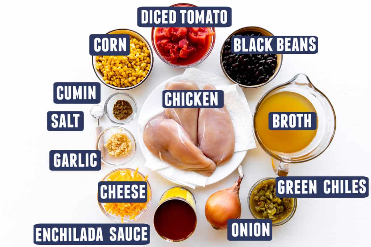 Ingredients needed to make chicken enchilada soup laid out on the counter. 