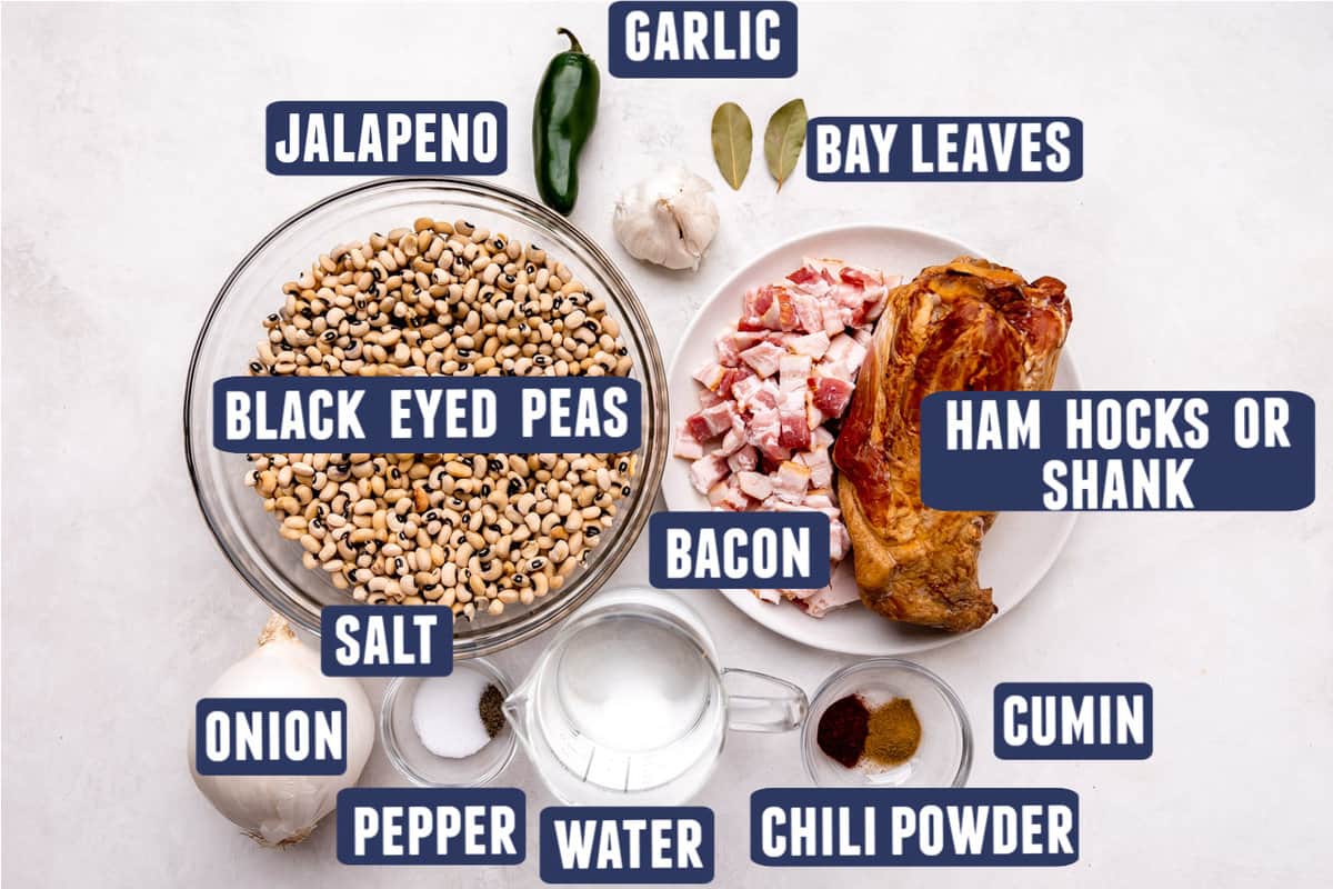 Ingredients needed to make black eyed peas laid out on the counter. 