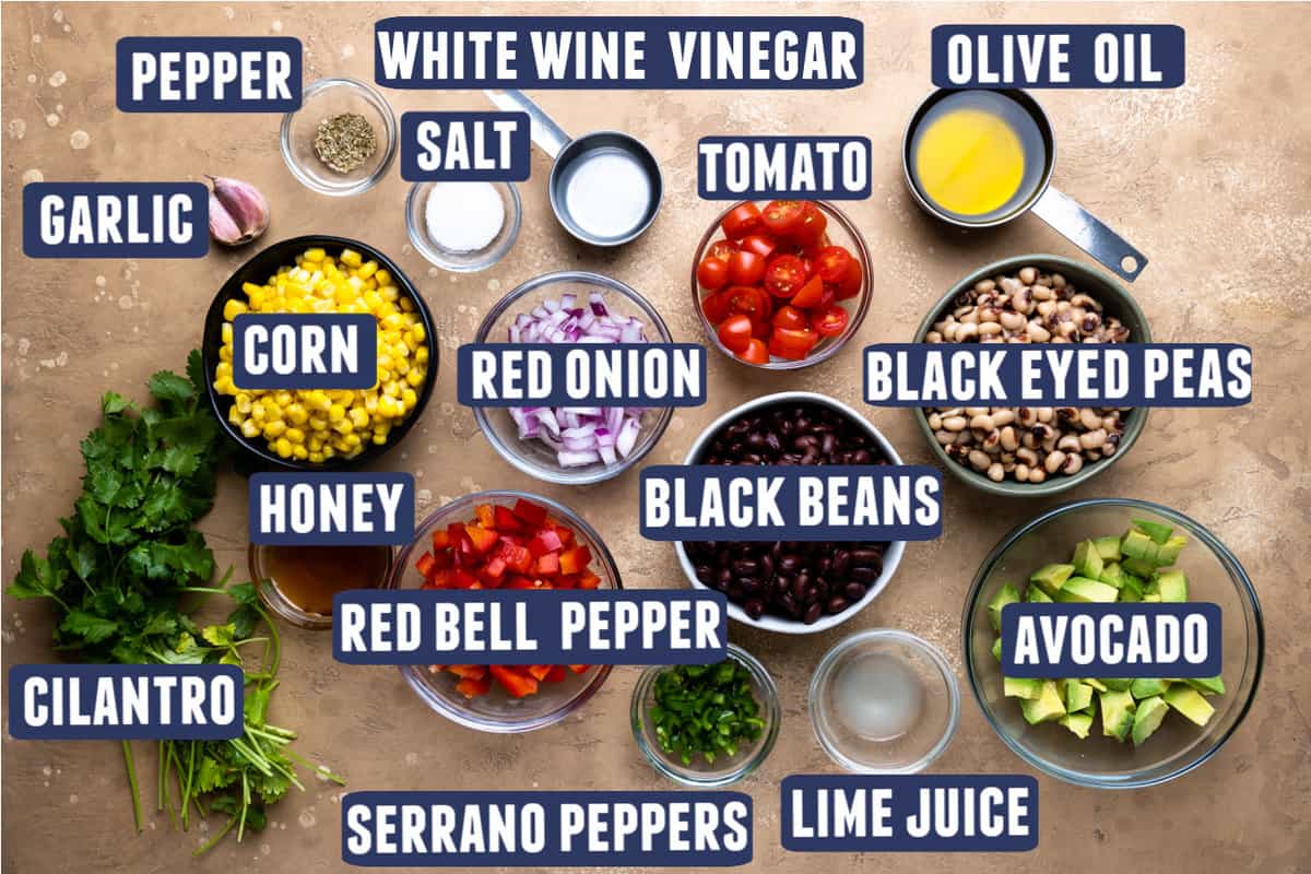 Ingredients needed to make Texas Caviar laid out on the counter. 