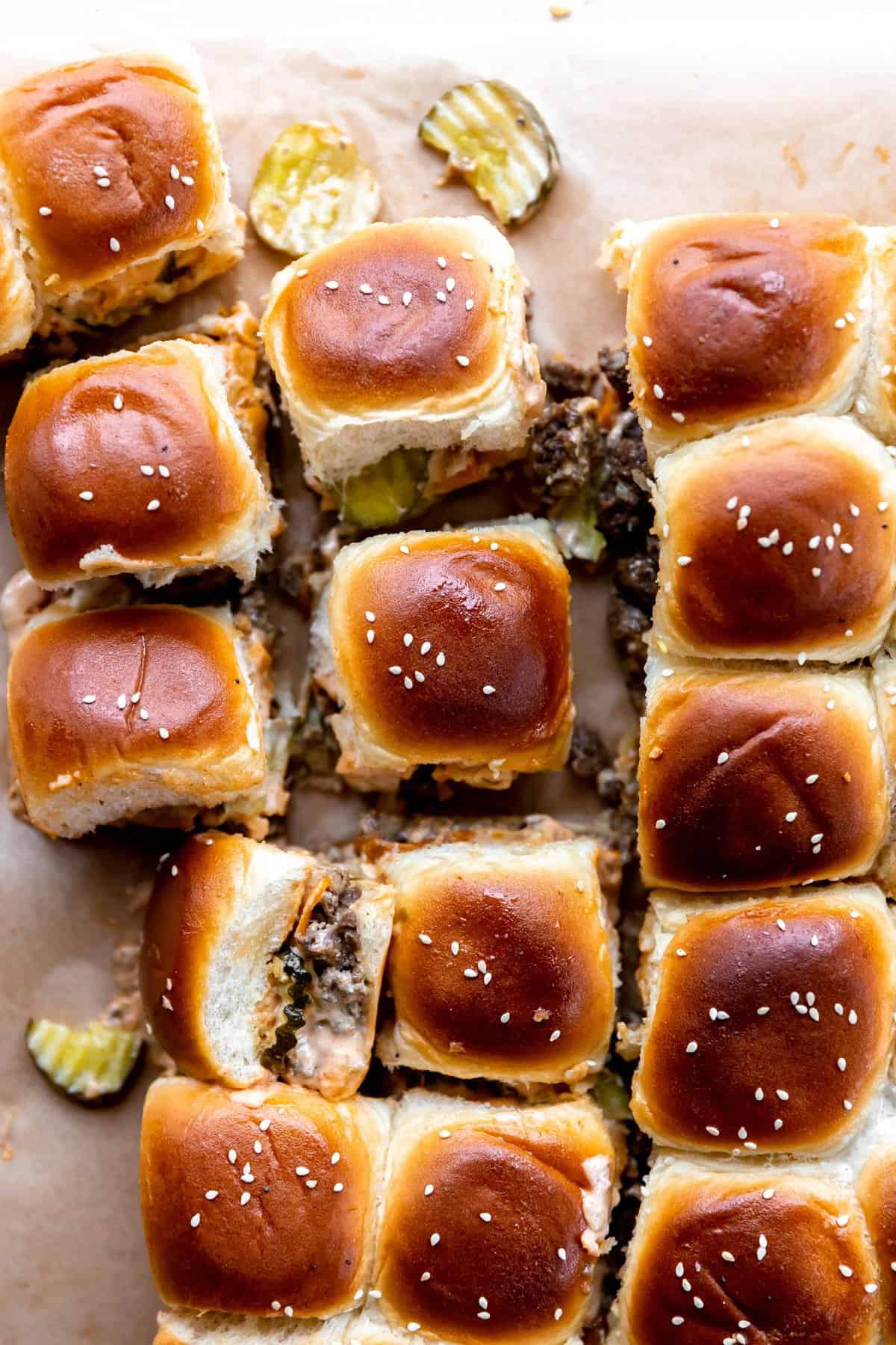 Cheeseburger Sliders on Hawaiian Rolls sliced and pulled apart.