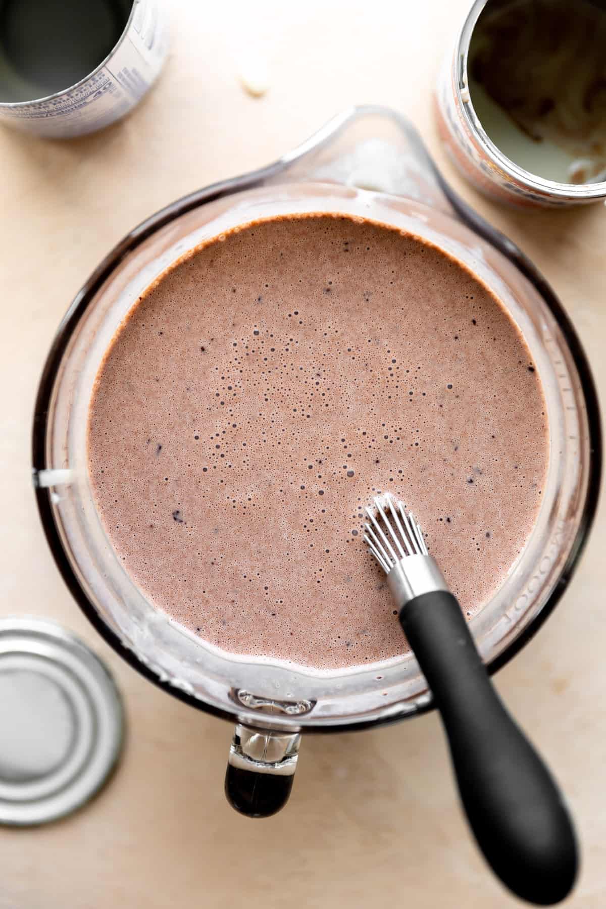 Chocolate milk mixture to pour over the cake. 