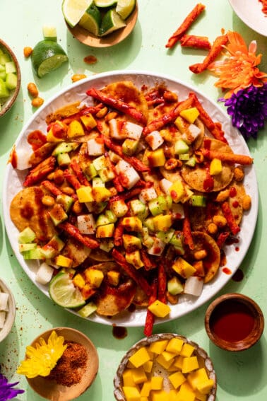 White plate with layered Tostilocos.