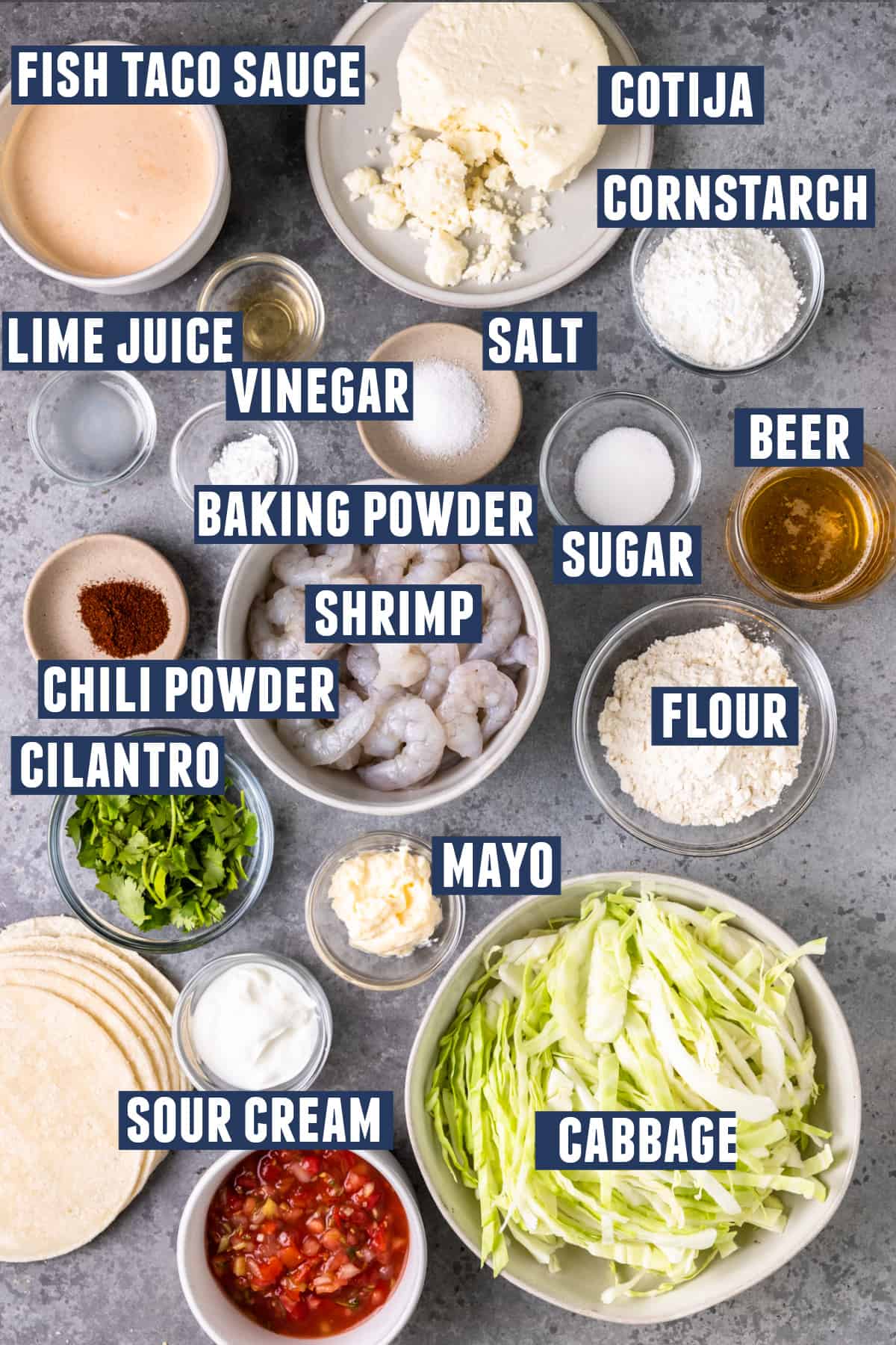 Ingredients needed for Baja shrimp tacos laid out on the counter for prep.