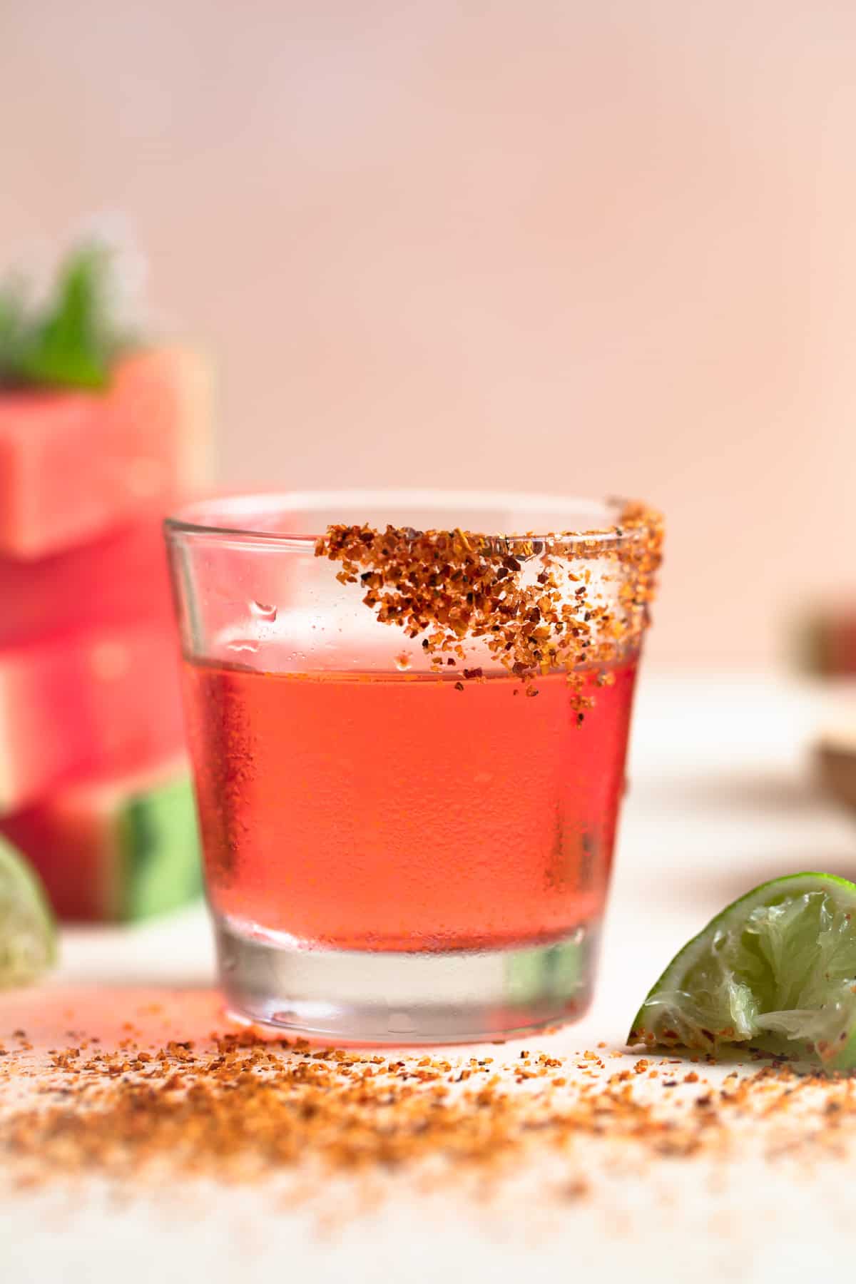 Shot glass filled with mexican candy drink. 