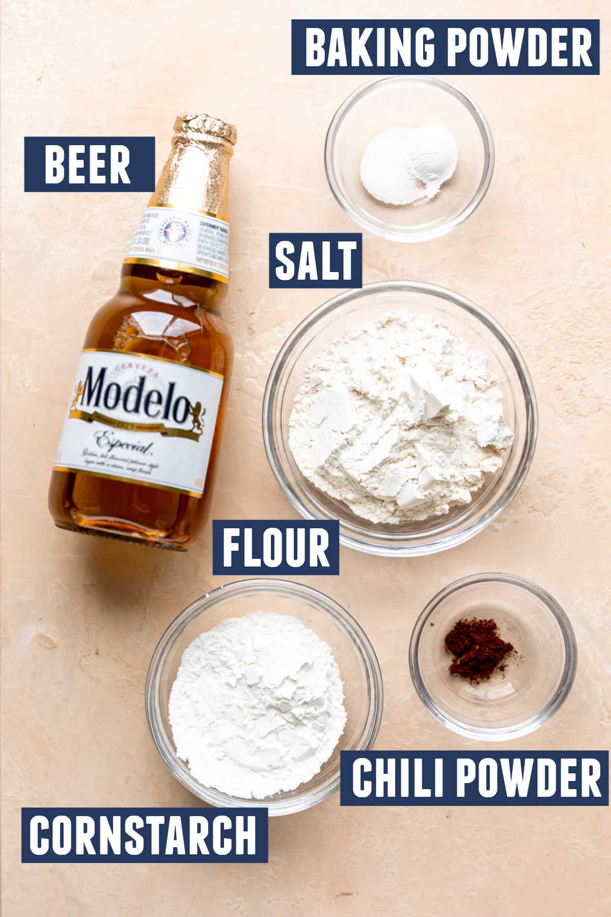 Ingredients needed to make a beer batter for fish laid out on the counter. 