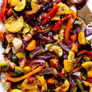 Plate of roasted mexican vegetables on a white plate.