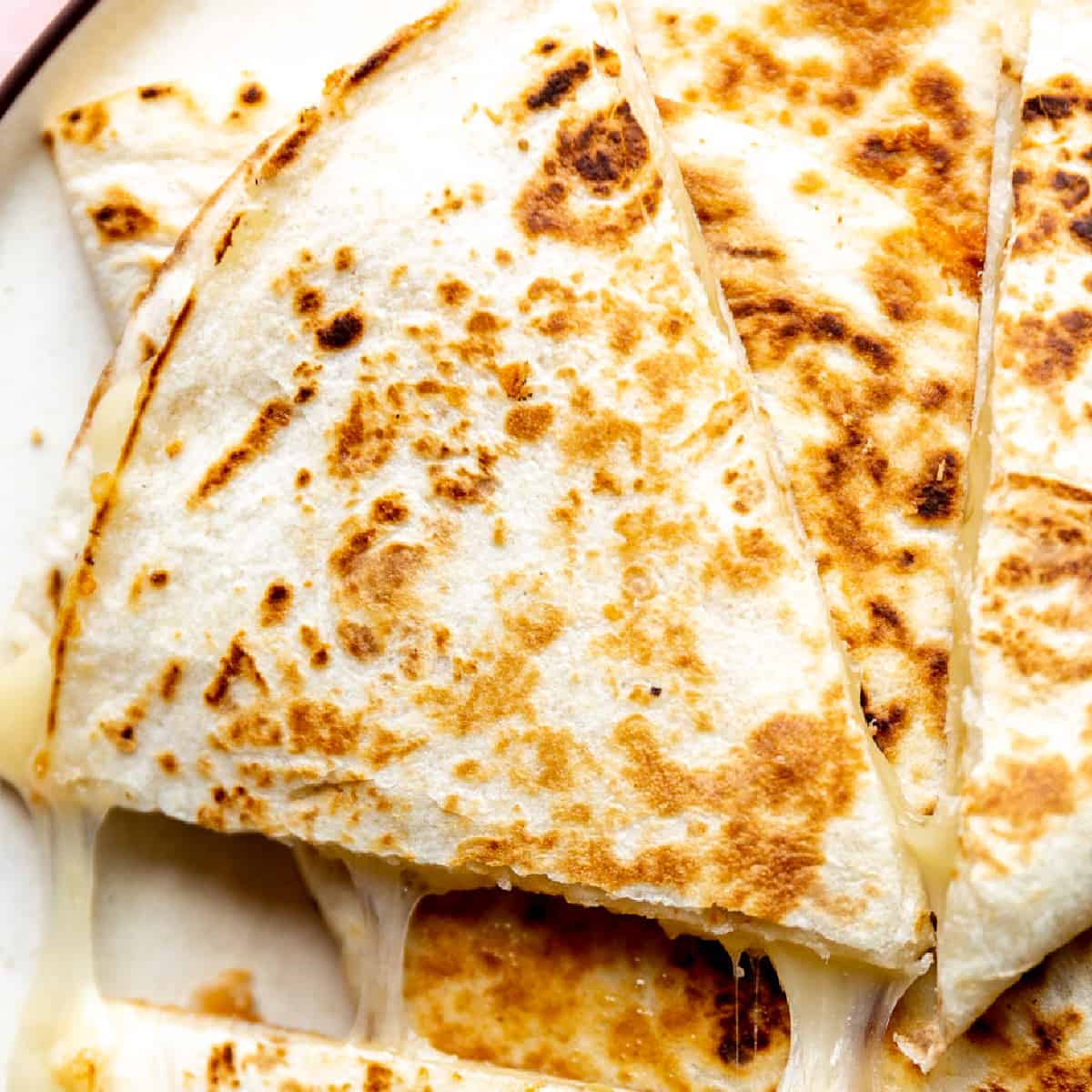 Sliced cheese quesadilla. 