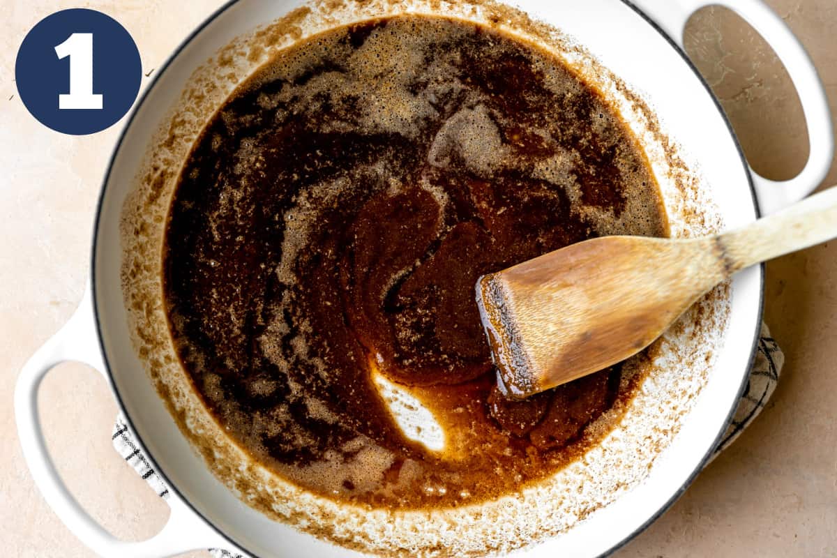 Skillet with melted butter and spices. 