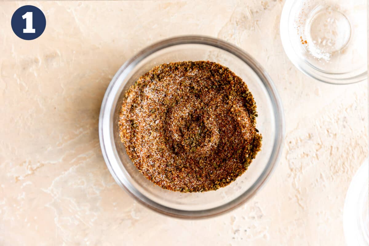 Small glass bowl of homemade fajita seasoning.
