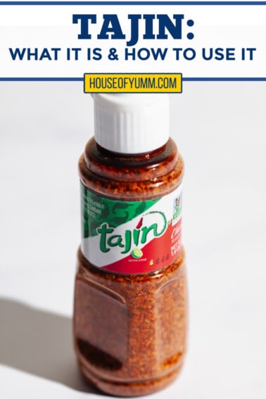 Bottle of Tajin with a white background.
