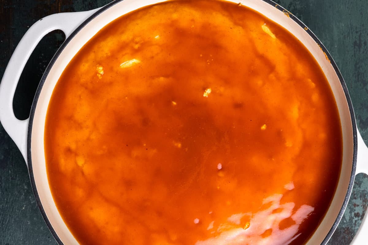 Cornbread with enchilada sauce poured over the top.