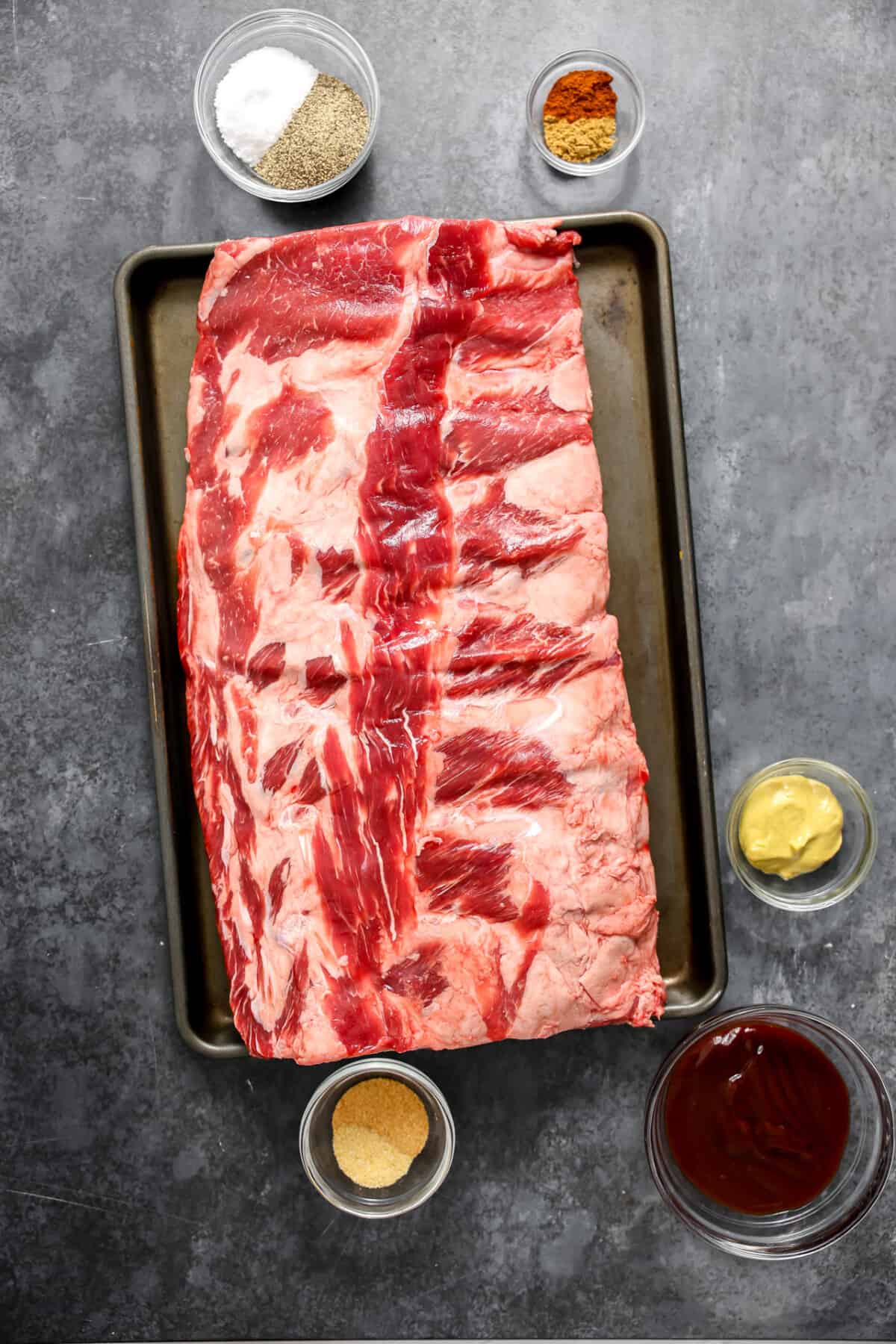 Ingredients needed to make oven baked beef ribs. 