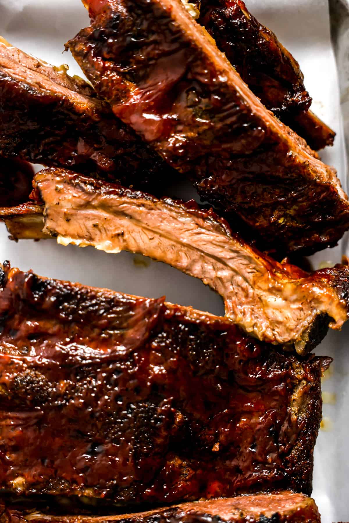 Up close cooked beef rib sliced apart. 